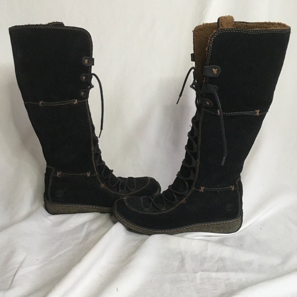 Knee high lace up timberland boots